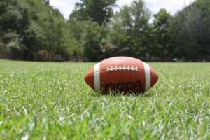 kigoa football on green grass during daytime