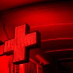 red neon cross sign