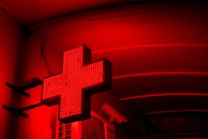 red neon cross sign